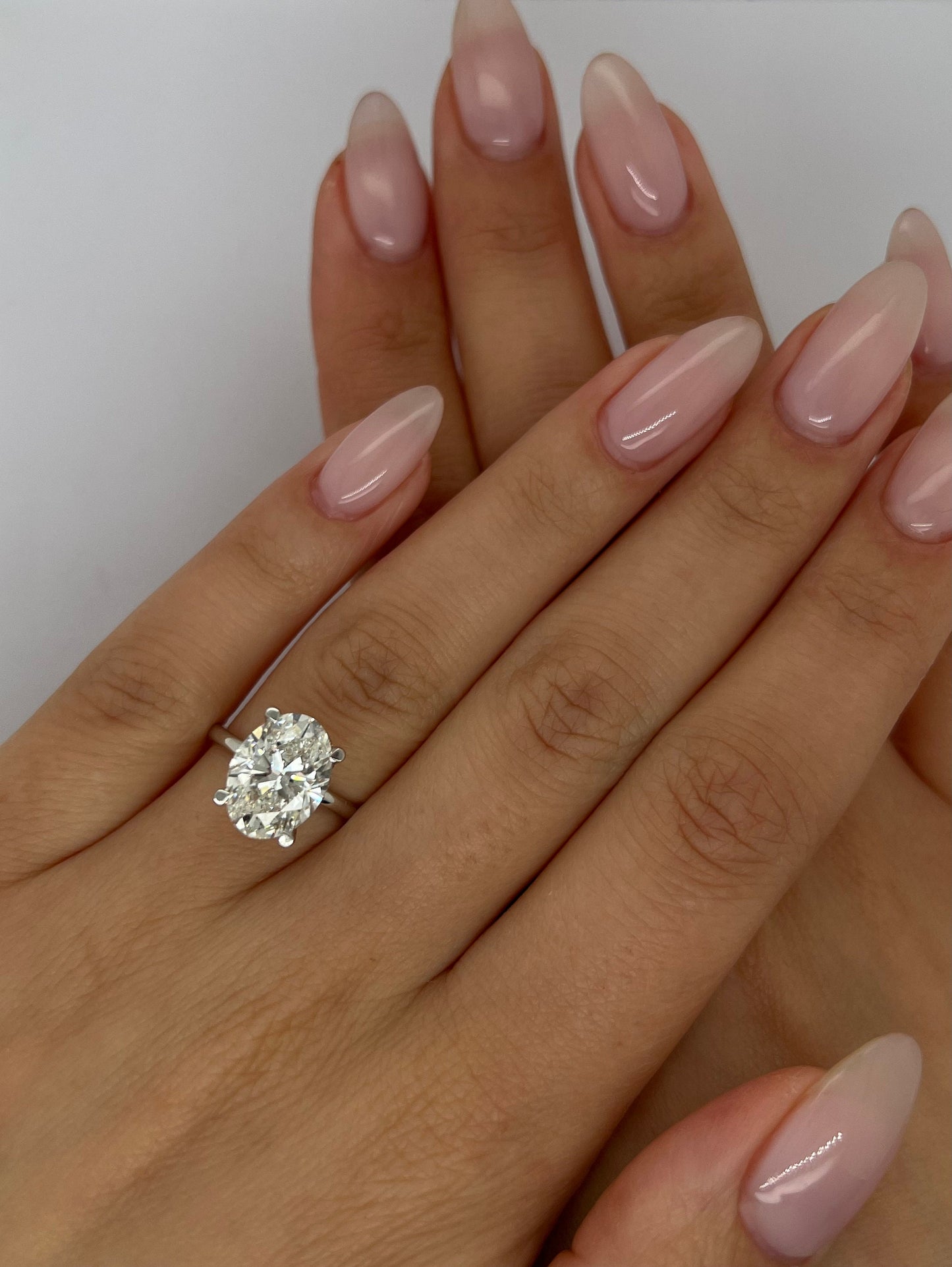 Oval Cut 4.15 carat F Color VS1 Clarity IGI Certified Lab Grown Diamond Solitaire with Hidden Halo Engagement Ring