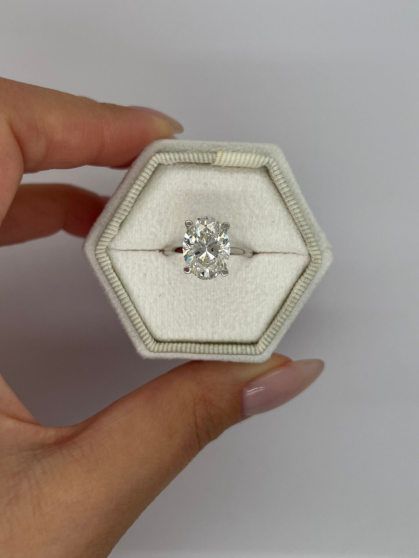 Oval Cut 4.15 carat F Color VS1 Clarity IGI Certified Lab Grown Diamond Solitaire with Hidden Halo Engagement Ring