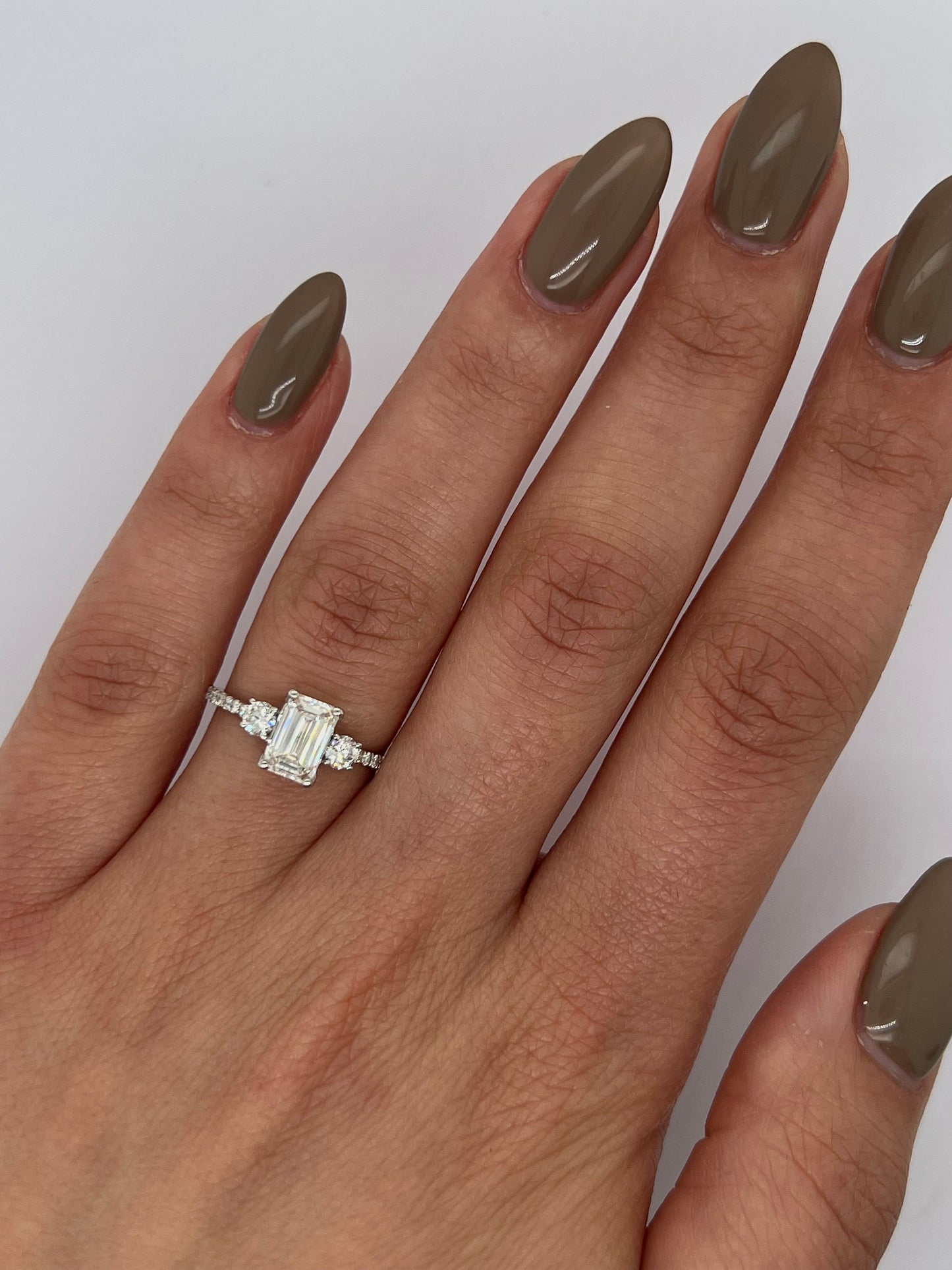 Emerald Cut 1.35 carat IGI Certified D Color VVS2 Clarity Lab Grown Diamond Three Stone Engagement Ring, Round Side Diamonds