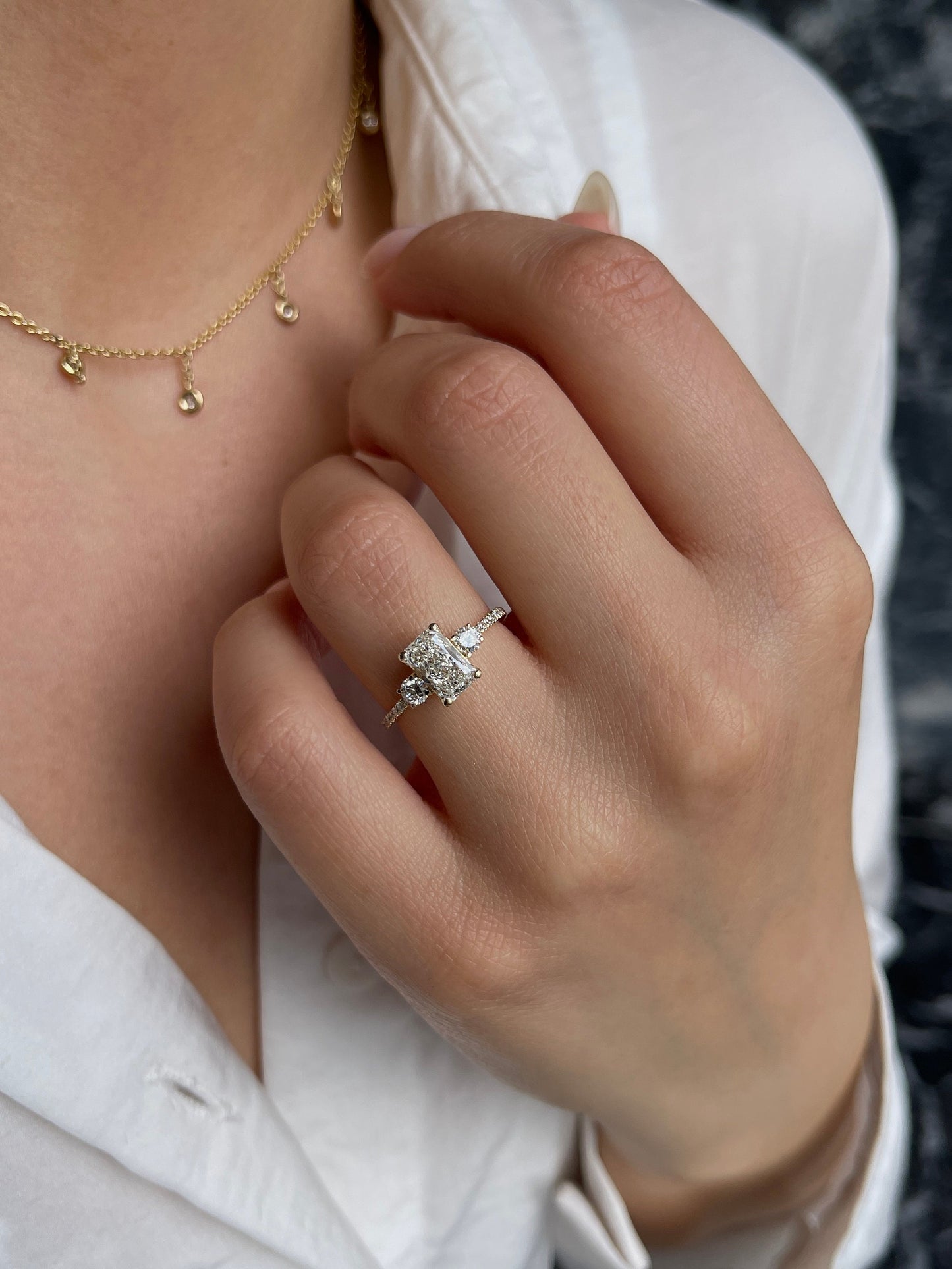 Radiant Cut 1.35 carat IGI Certified E Color VVS2 Clarity Lab Grown Diamond Engagement Ring, Round Side Diamonds