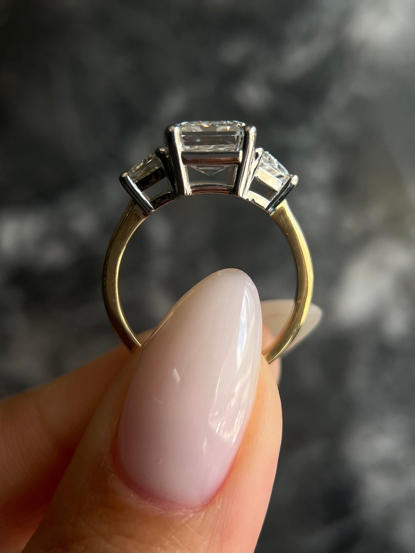 Special Two Tone Emerald Cut 5 carat IGI Certified E Color VVS2 Clarity Lab Grown Diamond Three Stone Engagement Ring, Side Trapezoids