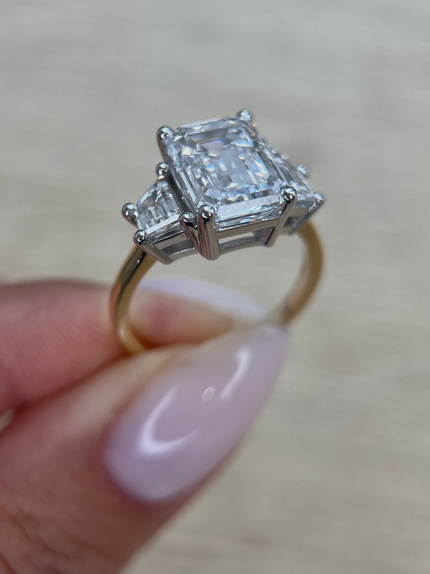 Special Two Tone Emerald Cut 5 carat IGI Certified E Color VVS2 Clarity Lab Grown Diamond Three Stone Engagement Ring, Side Trapezoids