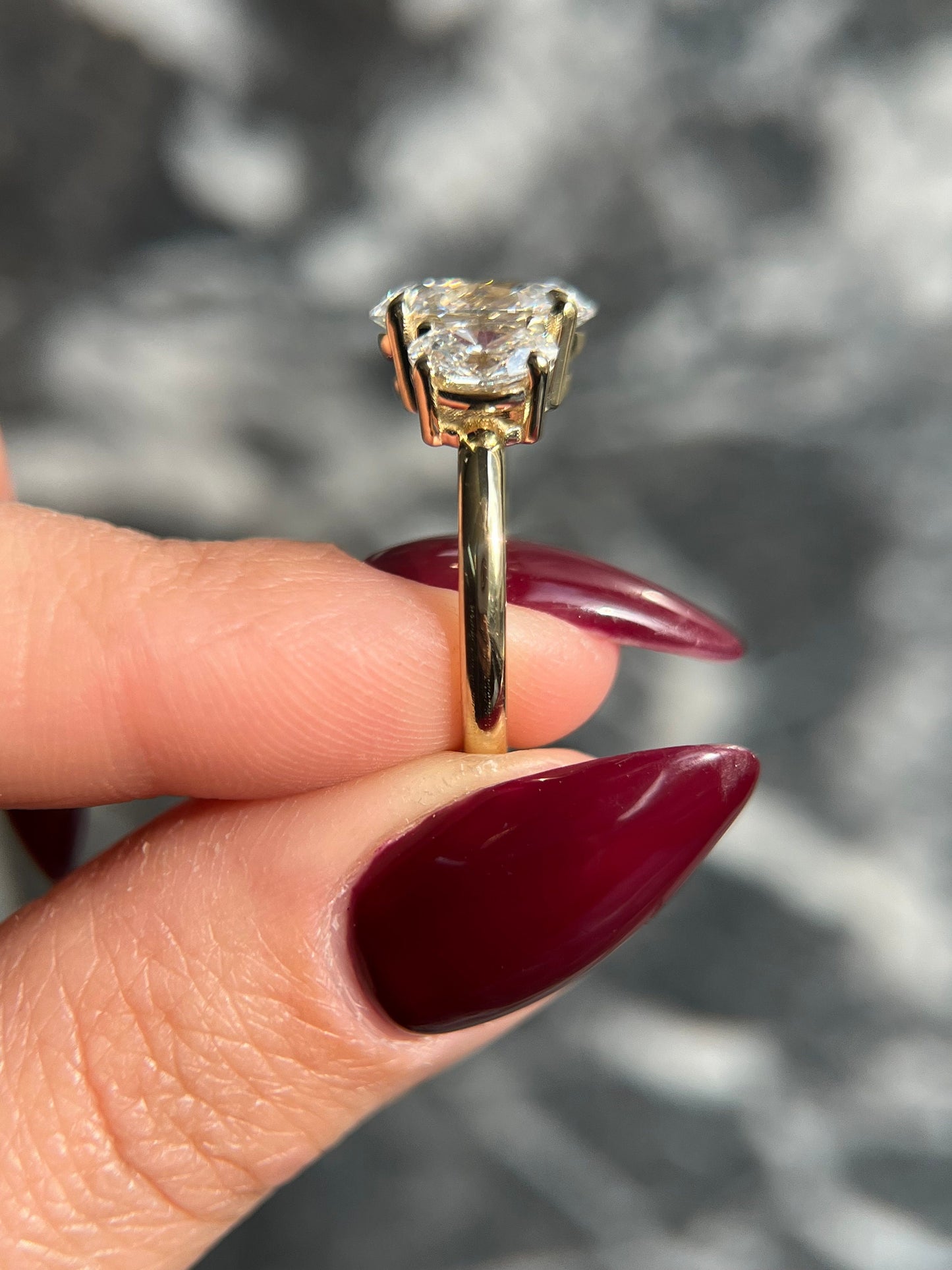 Oval Cut 5 Carat Lab Grown CVD Diamond Trilogy Three Stone Engagement Ring with an IGI Certified F Color VS1 Clarity Center Stone Diamond